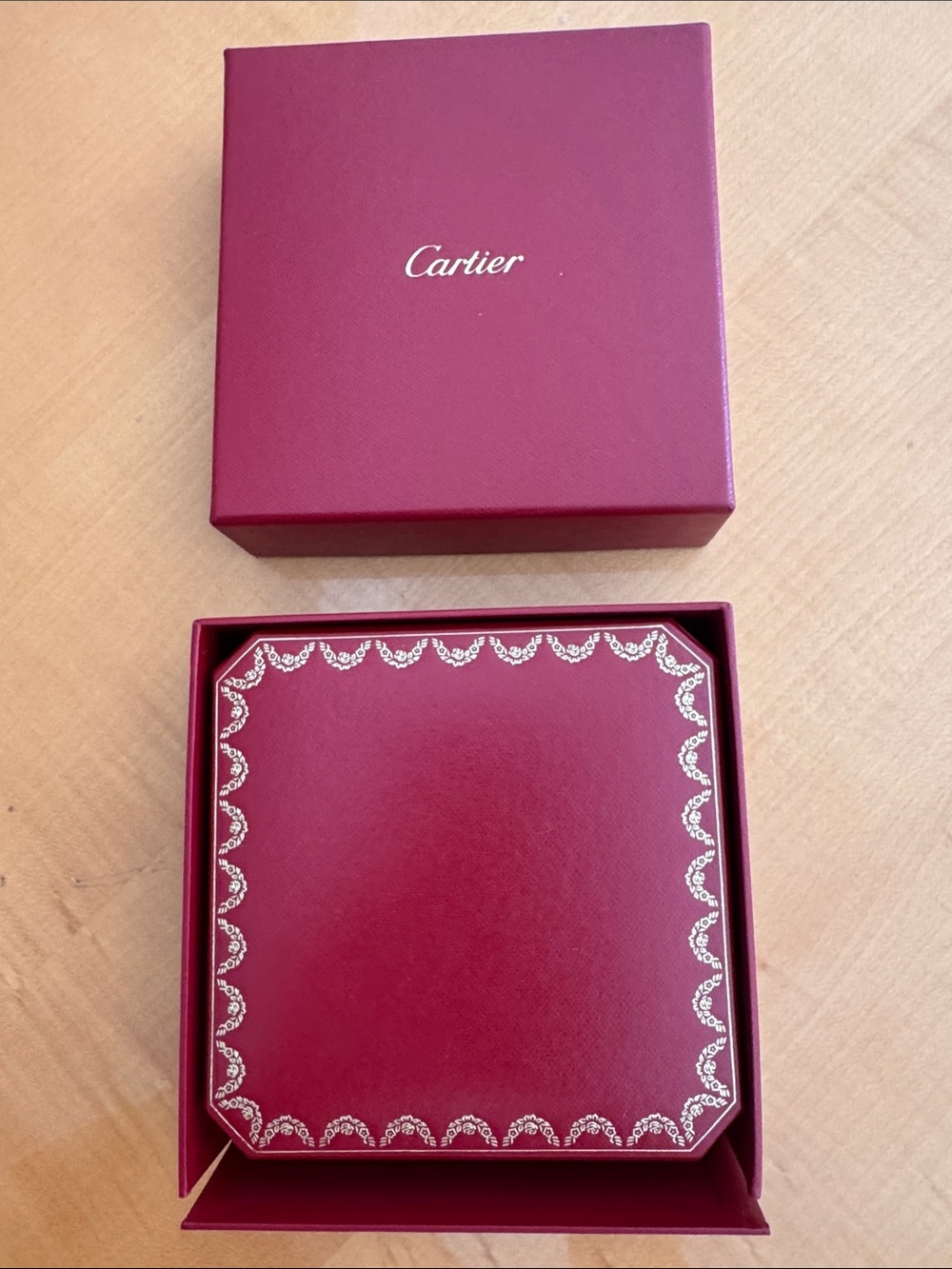 Cartier Burgundy Jewelry Box with Gold Detailing